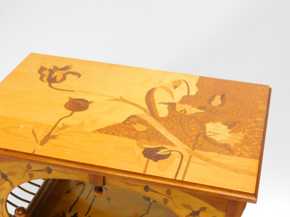 A marquetry two tier occasional table in the manner of Galle, the rectangular top inlaid with - Image 2 of 2