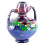 A Shelley Walter Slater lustre vase, of Art Nouveau style decorated in pink, purple, blue, green and