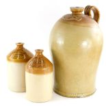 A stoneware four gallon flagon, stamped M Tuckwood, Grantham, (AF), 47cm high, a smaller stoneware