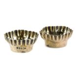 A pair of Victorian open silver salts, of floral form with fluted edges, Sheffield 1898, 1¼oz.