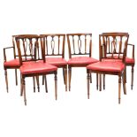 A set of six mahogany dining chairs, in 19thC style, each with a red leatherette padded seat. The