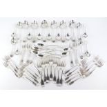 An associated set of early 19thC silver fiddle pattern cutlery, a set of twelve dessert forks,
