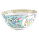 A Chinese porcelain bowl, decorated in raised enamels in famille rose Palette, with flowers,