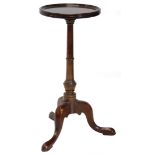 A Wade-Smith and Reed mahogany occasional table, the circular dish top on a turned column and tripod