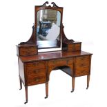 An Edwardian mahogany and marquetry dressing table, with a central mirror plate, a pierced swan neck