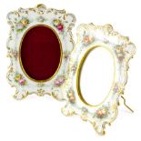 A pair of D & Co. Limoges porcelain photograph frames, each decorated with flowers, within rococo