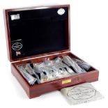 A Cooper Ludlam silver plated Kings pattern canteen of cutlery, in a mahogany case, with