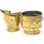 An embossed two handled brass jardiniere, with part fluted decoration, possibly Dutch, 29cm high,