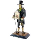 A Dutch painted spelter figural mantel clock, modelled in the form of a gentleman wearing a top hat,
