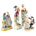 A collection of porcelain figurines, to include a gentleman and lady with flowers, and two dancing