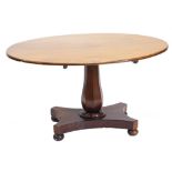 A Victorian mahogany breakfast table, the oval tilt top with a moulded edge, on a octagonal baluster