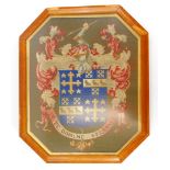 A Victorian wool work crest, in maple frame, 79cm x 57cm overall.