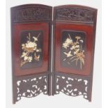A Japanese lacquer and Shiboyama two fold screen, decorated with birds, leaves, flowers, etc., (AF),