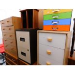 A collection of furniture, to include two chests of drawers, filing cabinet, bedside chest, CD rack,