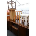 An oak sideboard with sliding doors, chipboard table, oak table, two stools.