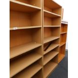 Modern open bookcases and a wardrobe unit. (4)