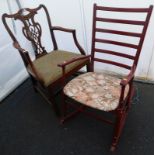 A mahogany open armchair in Chippendale style, with drop in seat, and a ladder back rocking chair (