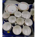 A Royal Albert Belinda pattern part tea service, comprising tea cups and saucers, sugar bowl, cake
