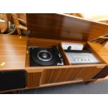 A Pye 1225 radiogram in teak effect case and some records, stamped to the label Pye Cambridge.