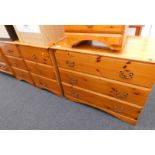 A pine chest of three drawers, a pair of pine bedside chests and another similar. (4)
