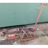 A mechanic's trolley jack, a pair of car ramps, and a Sprint hydraulic trolley jack. (4)