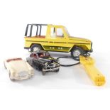 A Rico Spanish remote control model of a yellow Mercedes 30G Jeep, together with a battery