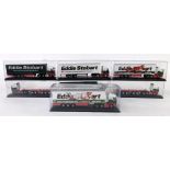 Seven Oxford die cast Eddie Stobart lorries, five with containers, cased.