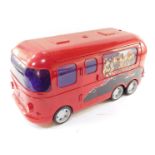 An MGA Entertainment Bratz Rock Angelz red tour bus, with a fitted interior, 56cm wide.