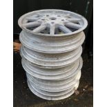 Five unnamed ten spoke alloy wheels, 21 1/2" diameter.