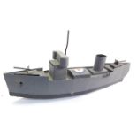 A scale model of a WWII British Naval gun boat, raised on rollers, 59cm wide.