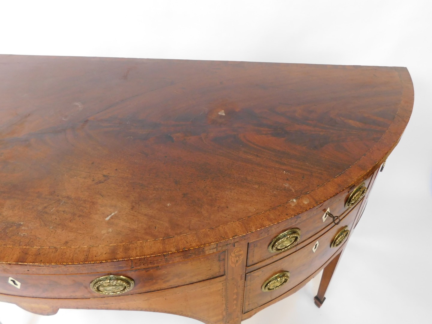 A George III mahogany demi lune sideboard, with cross banded and line inlaid top, an arrangement of - Image 4 of 11