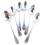 A set of six George III silver teaspoons, with bright cut engraving, Charles Hougham, London 1791, 2