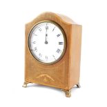 An Edwardian mahogany and inlaid mantel clock, enamel dial bearing Roman numerals, clock work moveme