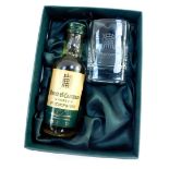 A 5cl bottle of House of Commons 12 years old number 1 Scotch Whisky, together with a whisky glass,