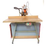 A DeWalt radial arm saw, model DW8001, 2800rpm.