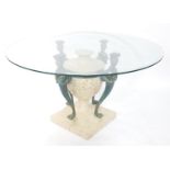 A circular glass top urnular monopodia centre table, 74cm high, 135cm diameter.