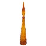 An Empoli vintage amber glass bottle and stopper, of tapering form, moulded with bands of waves, 57c