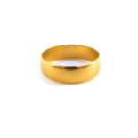 A 22ct gold wedding band, size P, 3.5g.