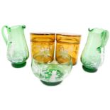 A group of Mary Gregory type amber and green glass ware, comprising a pair of cylindrical jars and c