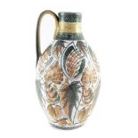 A Denby pottery 1960's flagon designed by Glyn College, decorated with stylised leaves, printed mark