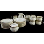 A Denby pottery part tea service decorated in the Daybreak pattern, comprising milk and cream jugs,