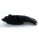 A Japanese late Taisho / early Showa period wooden netsuke, possibly ebony, carved as a crayfish, i