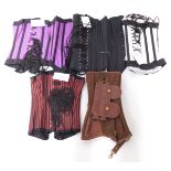 Five heavy steel boned training corsets, size 22, to fit 24-28 inch waist, comprising black satin, r