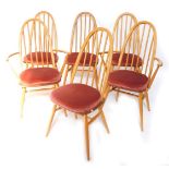 A set of six Ercol Windsor Quaker light elm and ash dining chairs, with loose cushion seats, compris