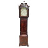 Joseph Wilson of Stamford. An early 19thC flame mahogany longcase clock, the enamel break arch dial