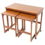 An A H Mackintosh & Company Ltd teak trolley, with a fold over top, enclosing two smaller tables, ra