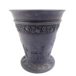 A 20thC Wedgwood black basalt vase, of tapering footed form, liner lacking, traditionally decorated