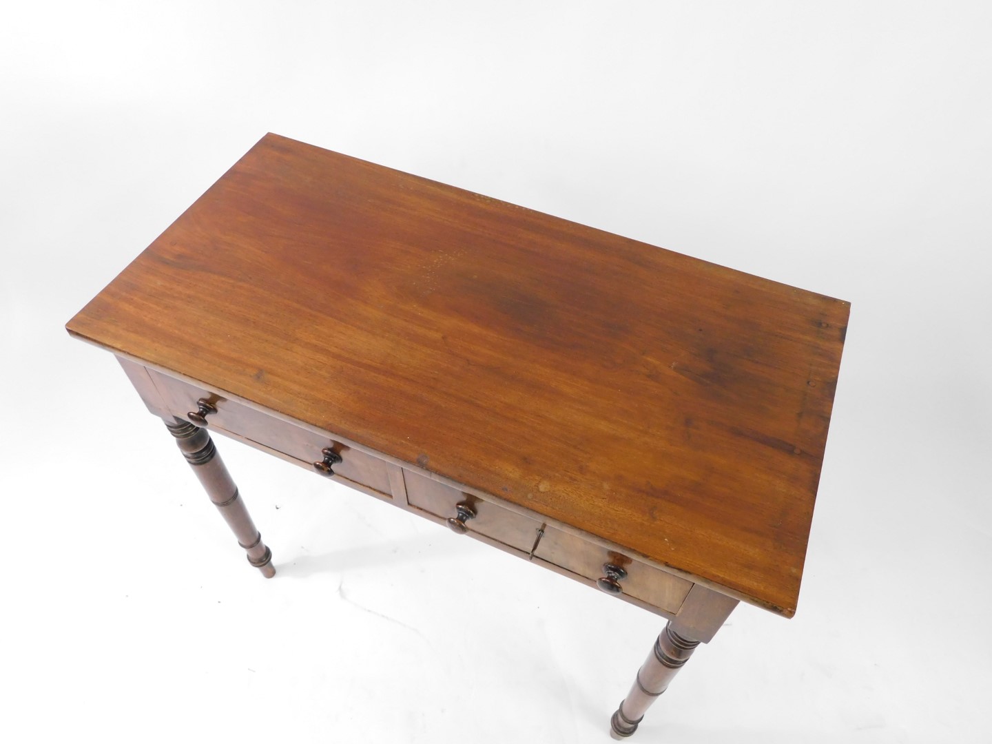 A late Georgian mahogany side table, with two frieze drawers, one lockable, raised on ring turned le - Bild 2 aus 3