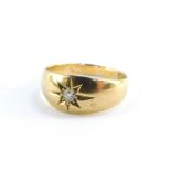 An Edwardian 18ct gold and diamond solitaire ring, size O, 3.6g.