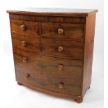 A Victorian mahogany bow front flame mahogany chest, of two short over three long drawers raised on